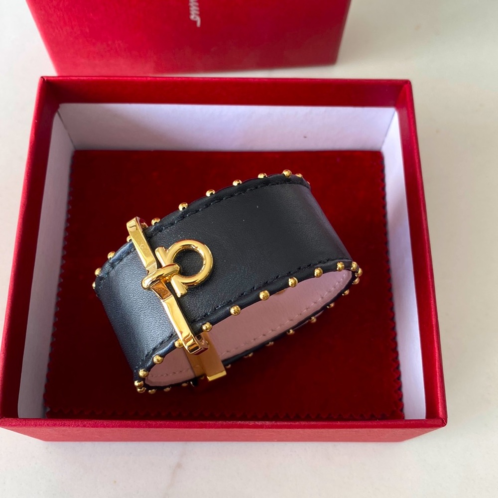 Salvatore Ferragamo black & gold cuff bracelet.